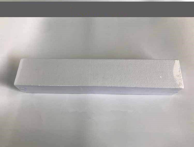 White rectangular packaging box for Trendoligy wireless Bluetooth soundbar on a white surface