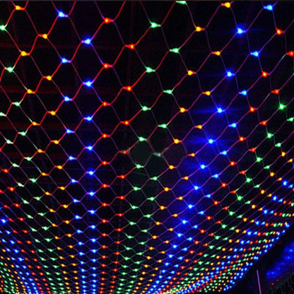 Colorful LED net lights with red, blue, green, and yellow bulbs creating a vibrant grid pattern at night