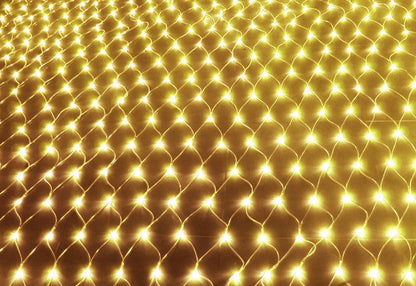 Warm white LED net lights illuminating in a grid pattern, perfect for outdoor Christmas decoration