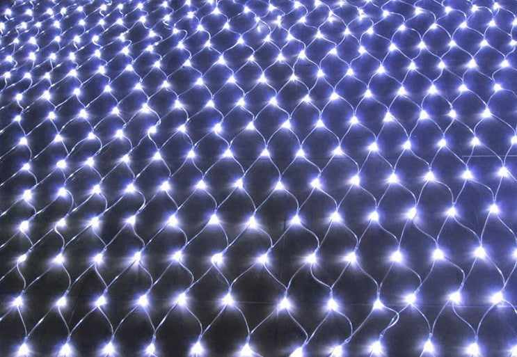 Waterproof outdoor LED net lights with warm white bulbs neatly arranged on a dark surface