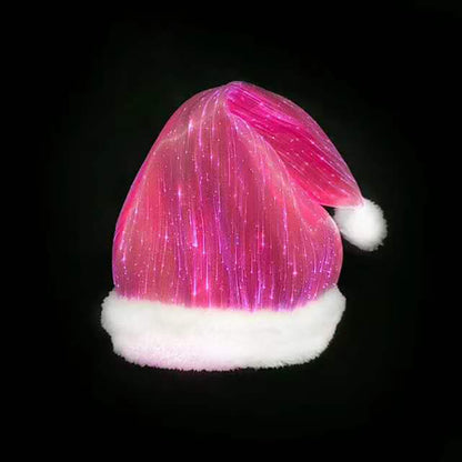 Glowing pink LED fiber optic Christmas Santa hat with white fur trim and pompom on black background