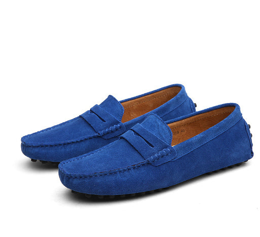 Pair of dark blue men's driving loafers made of cowhide leather with anti-skid rubber sole