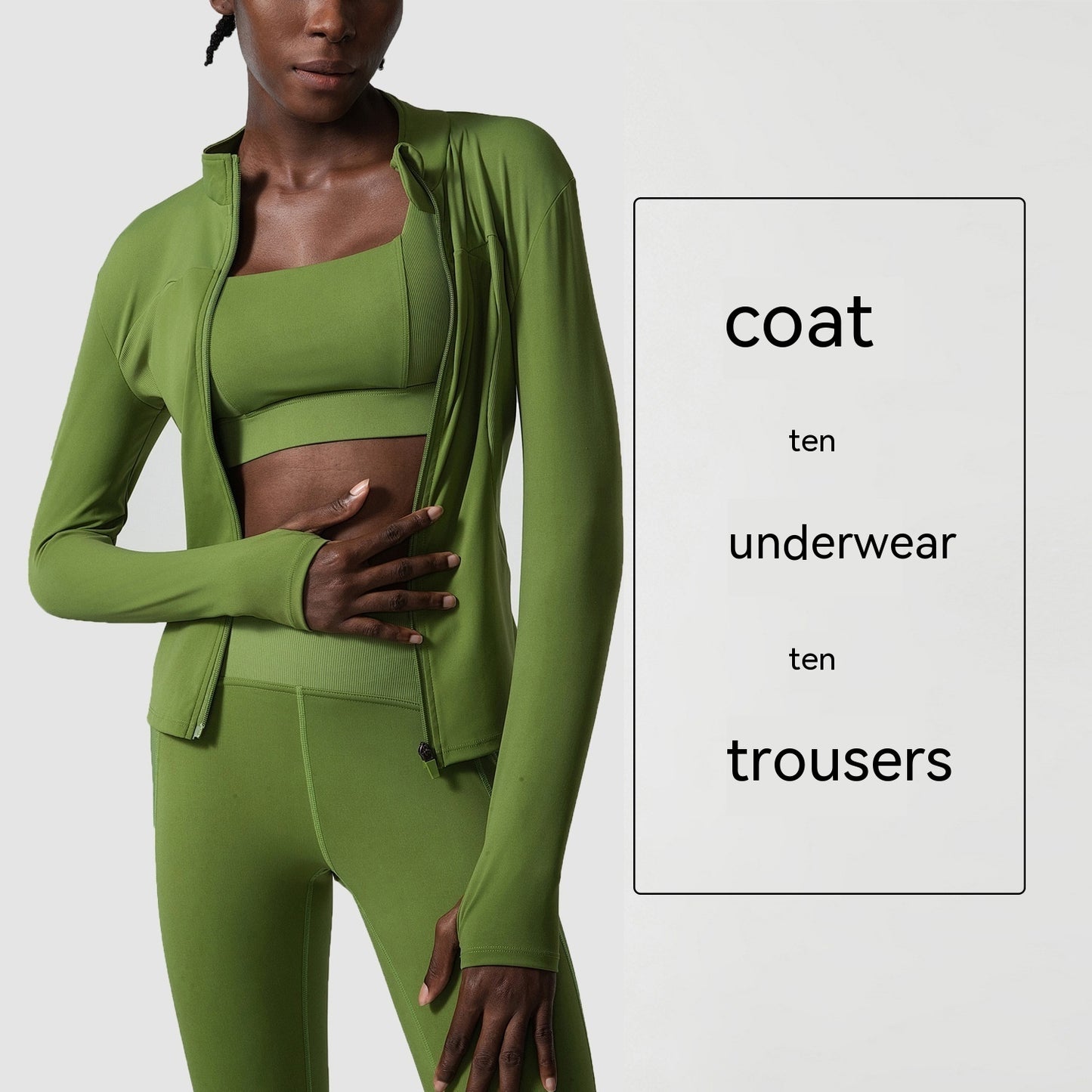 Plus-size model wearing dark green quick dry activewear three-piece yoga suit with coat, top, and trousers