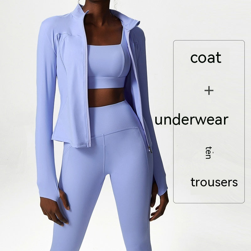 Woman in lavender activewear set with zip-up jacket, sports bra, and high-waisted leggings