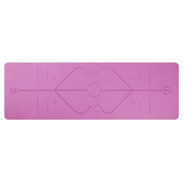 Pink cushioned non-slip yoga mat with position alignment lines and textured surface