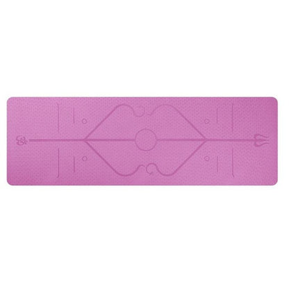 Pink cushioned non-slip yoga mat with position alignment lines and textured surface