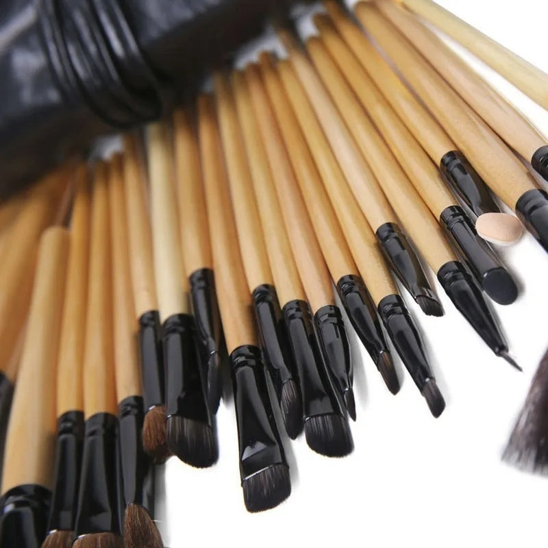 24-piece professional makeup brush set with wooden handles and black ferrules in PU leather case