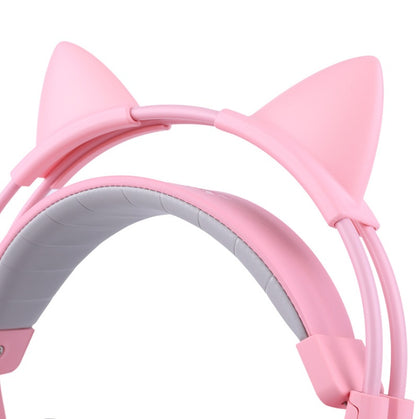 Close-up of pink cat ear gaming headset with padded white interior headband