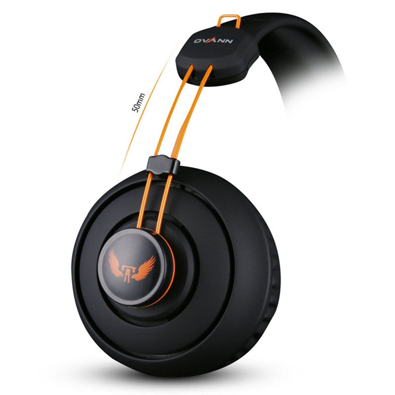 Black Ovann gaming headset with orange accents and adjustable 50mm drivers on white background