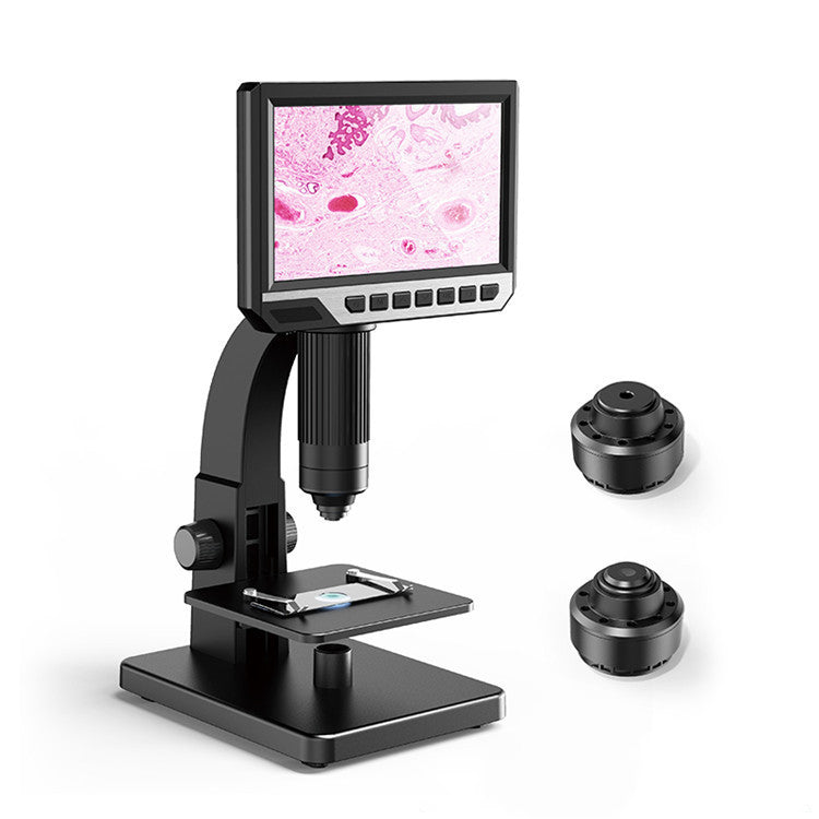 Black digital microscope with 7-inch screen showing pink microscopic slide, two lens attachments on white background