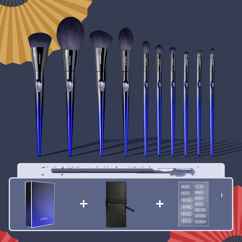 10-piece blue makeup brush set with nylon bristles and black handles on dark background