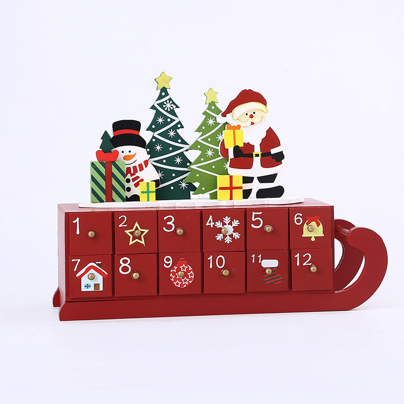 Red wooden Christmas advent calendar with Santa, snowman, trees, and gift decorations