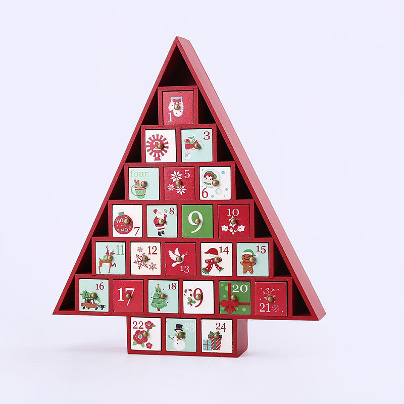 Wooden Christmas tree-shaped advent calendar with numbered drawers and festive holiday icons