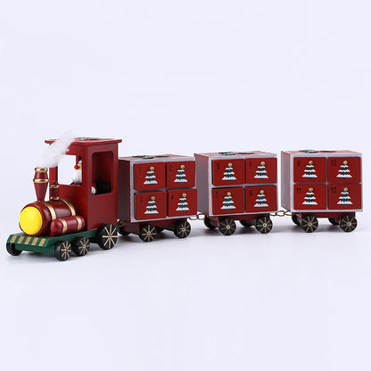 Handmade wooden Christmas train with numbered red drawers and festive tree designs holiday decor