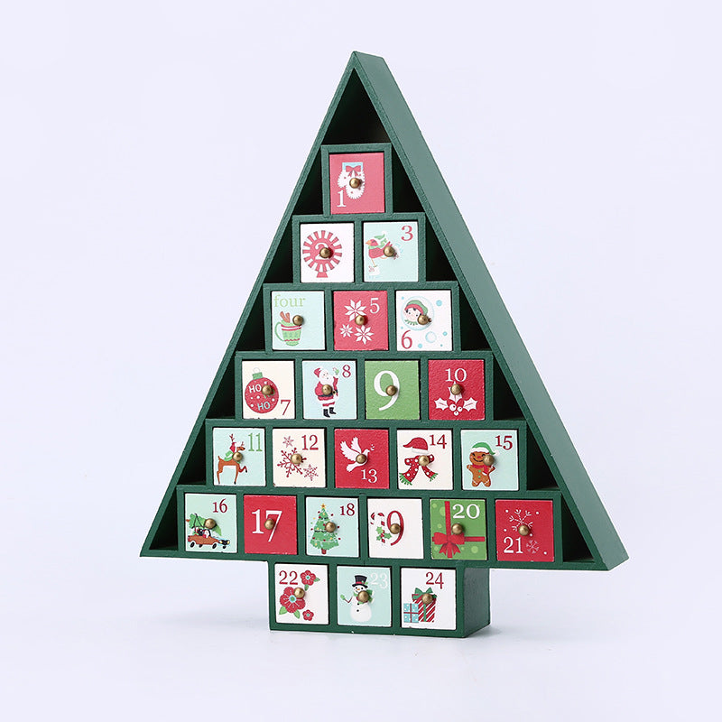 Green wooden Christmas tree advent calendar with numbered drawers and festive holiday designs