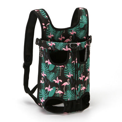 Black pet carrier backpack with pink flamingo and green leaf print, designed for small dogs