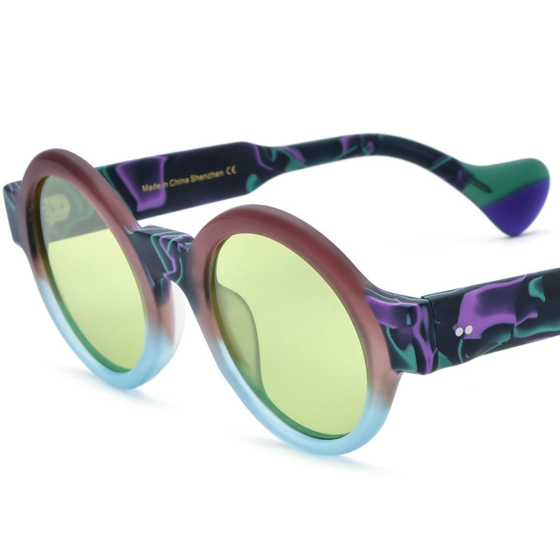 Frosted green and purple round sunglasses with yellow tinted polarized lenses and matte finish