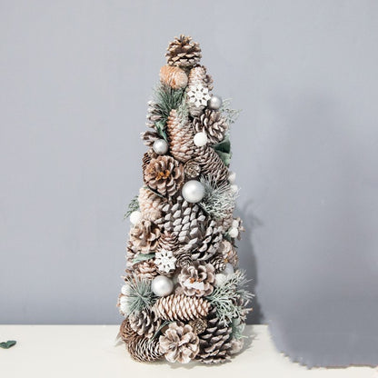 Decorative Christmas pinecone tree with frosted pinecones, silver baubles, and white snowflakes