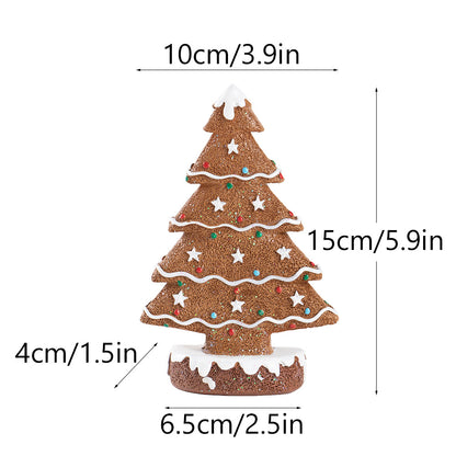 Ginger cake Christmas tree decoration with white icing and colorful star accents, 15cm tall