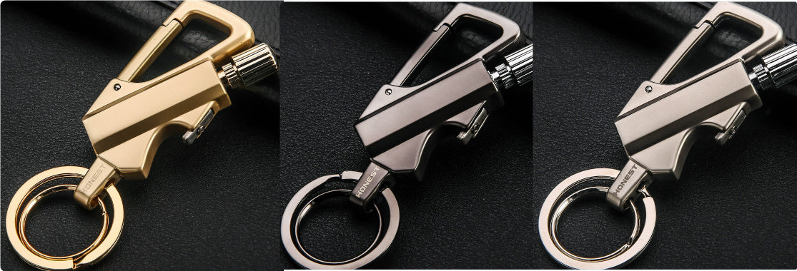 Set of three metal keychain lighters in gold, black, and silver colors with bottle opener and flint wheel