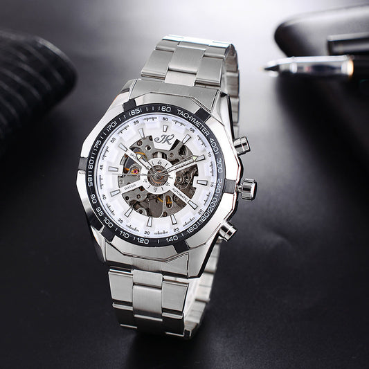 silver men's mechanical watch with skeleton dial, tachymeter bezel, and stainless steel band on black surface