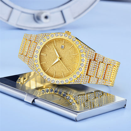 Gold quartz men's watch with diamond-studded strap and calendar on reflective surface