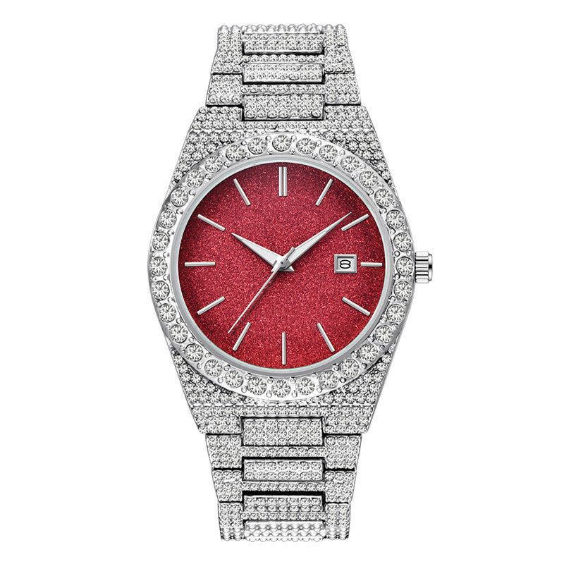 Luxury silver watch with sparkling crystals and a red glitter dial featuring a date display