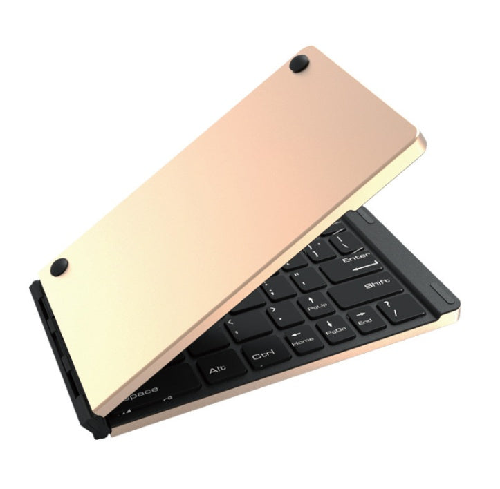 Gold foldable Bluetooth portable wireless keyboard with black keys and ultra-thin design