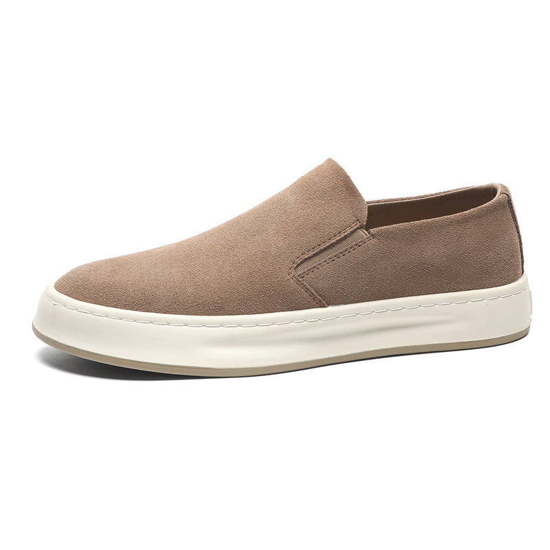 Brown suede men's slip-on casual shoe with white rubber sole on white background