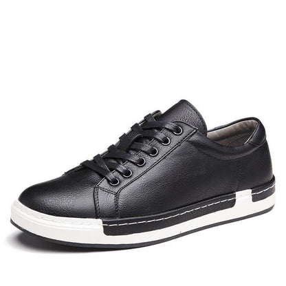Black men's leather sneaker with black laces and white rubber sole on white background