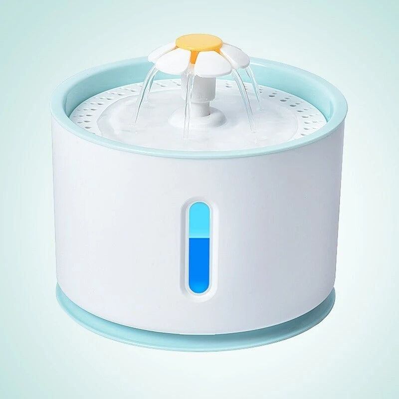 White and blue pet water fountain with flower-shaped dispenser and water flow streams