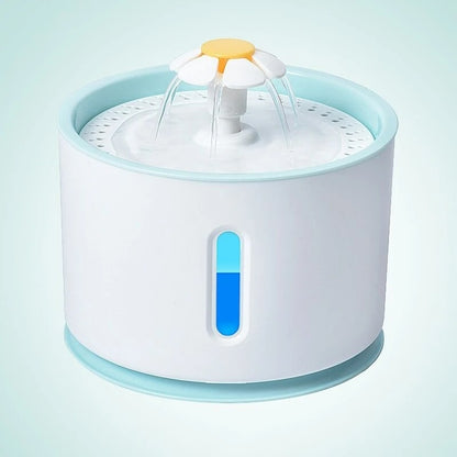 White and blue pet water fountain with flower-shaped dispenser and water flow streams