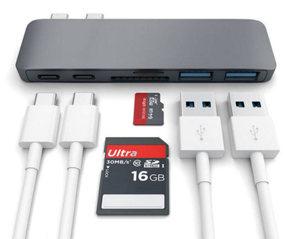 Gray Trendoligy USB-C hub with SD and TF card slots, two USB-C cables, two USB-A cables, SD and microSD cards
