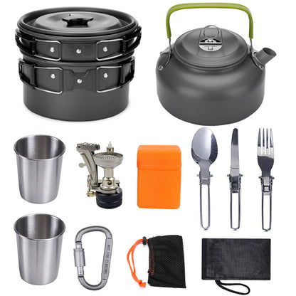 Lightweight green-handled camping cookware set with kettle, pots, cups, stove, utensils, and carrying pouches