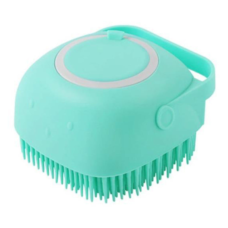 Mint green silicone pet bath brush with soft bristles and handle for grooming