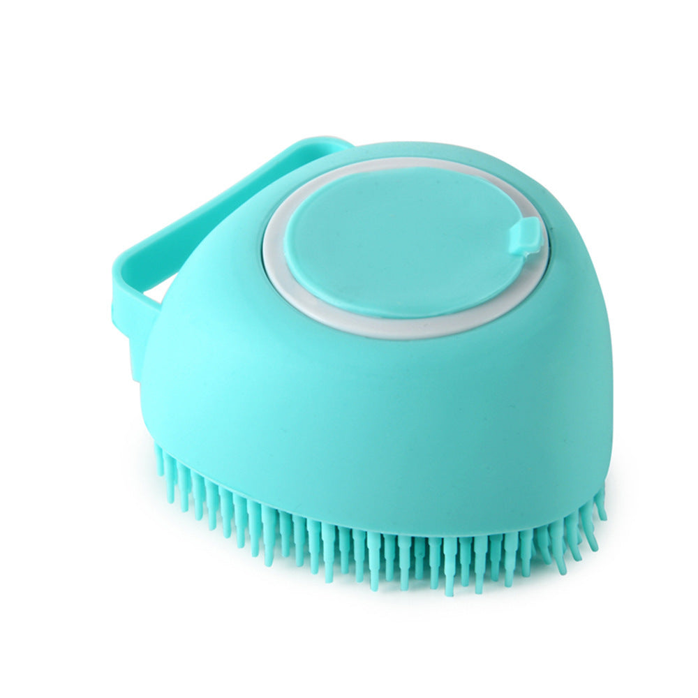 Blue round silicone dog bath brush with soft bristles and built-in shampoo dispenser