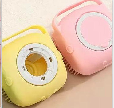 Yellow and pink square silicone dog bath brushes with soft bristles and built-in shampoo dispensers