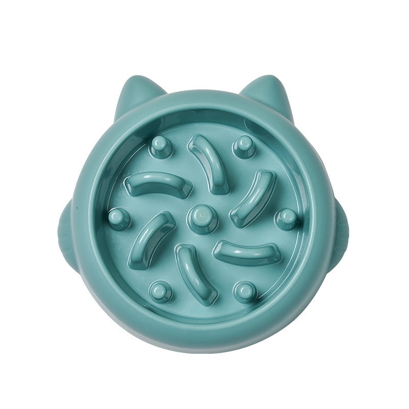 Green bone-shaped slow feeder dog bowl with paw print and raised sections to prevent gulping