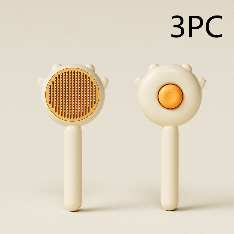 3-piece beige and orange pet grooming brush set with fine metal teeth for hair removal