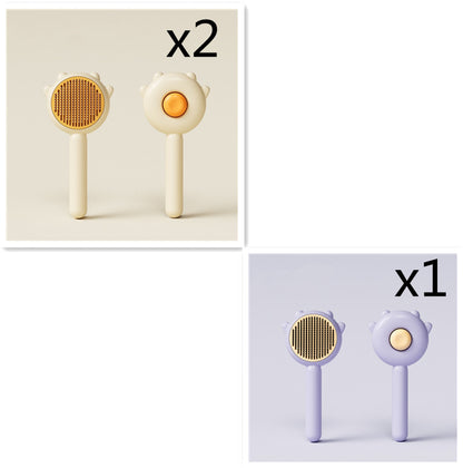 Two beige and one purple pet grooming brushes with yellow bristles and buttons, shown front and back