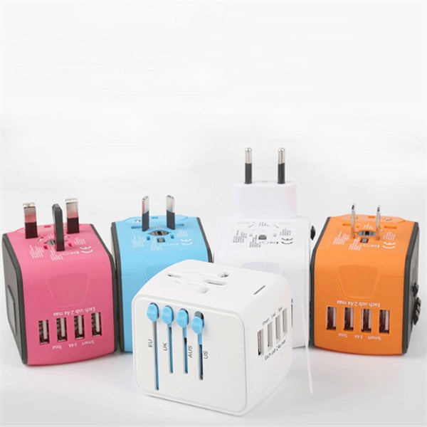 Colorful universal travel adapters with USB ports in white, pink, blue, orange, and white variations