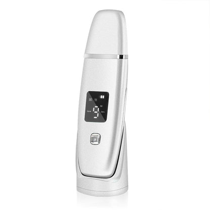 white ultrasonic blackhead remover device with digital display and single button on stand