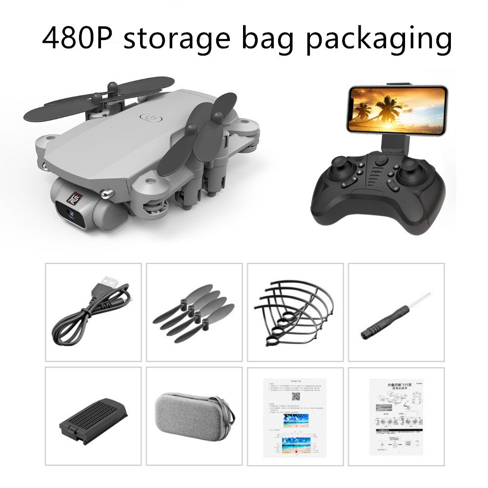 Compact grey foldable mini drone with 4-axis propellers, remote controller with phone mount, USB cable, extra propellers, propeller guards, screwdriver, battery, carrying storage bag, and user manuals