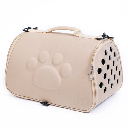Beige foldable pet carrier with paw print design and ventilation holes for dog and cat travel