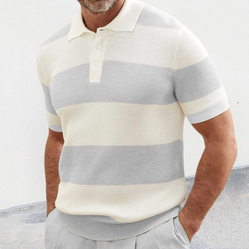 Man wearing slim fit short sleeve polo sweater with wide gray and cream horizontal stripes