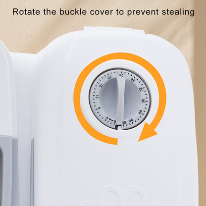 Close-up of white automatic pet feeder timer dial with orange rotation arrow and theft prevention text