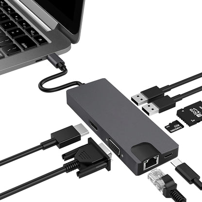 Grey Trendoligy USB-C hub connected to laptop with HDMI, VGA, Ethernet, USB, and card reader ports