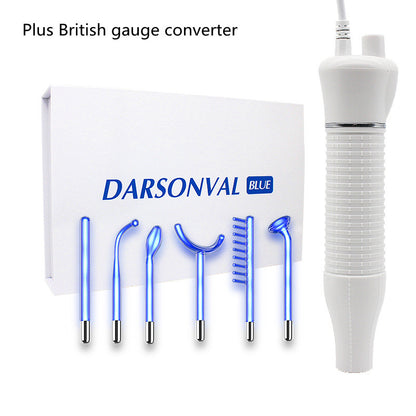 White Darsonval Blue high frequency electrotherapy wand set with six blue glowing glass electrodes and British gauge converter