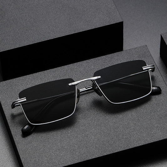 Black and gray polarized retro-style sunglasses with gunmetal frame on textured dark surface