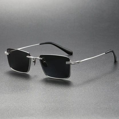 Retro style black and gray polarized sunglasses with rectangular lenses and metal frame on gray background
